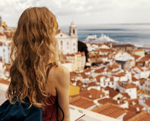 A landscape shot of a young female traveler